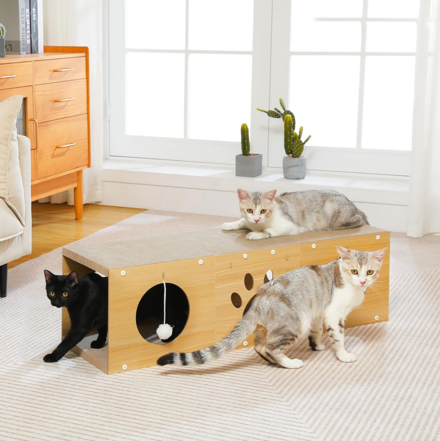 Interactive cardboard cat tunnel with scratcher and pom pom toys