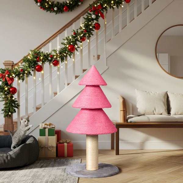 Christmas tree–shaped cat scratching post in holiday living room — 31.5-inch sisal tower with fleece base-pink